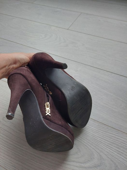 Botins marca Xti