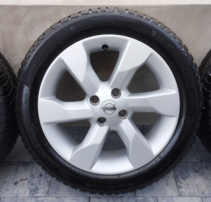 Oryginalne felgi koła NISSAN 16 cali 4x100 + MICHELIN wielosezon 2022