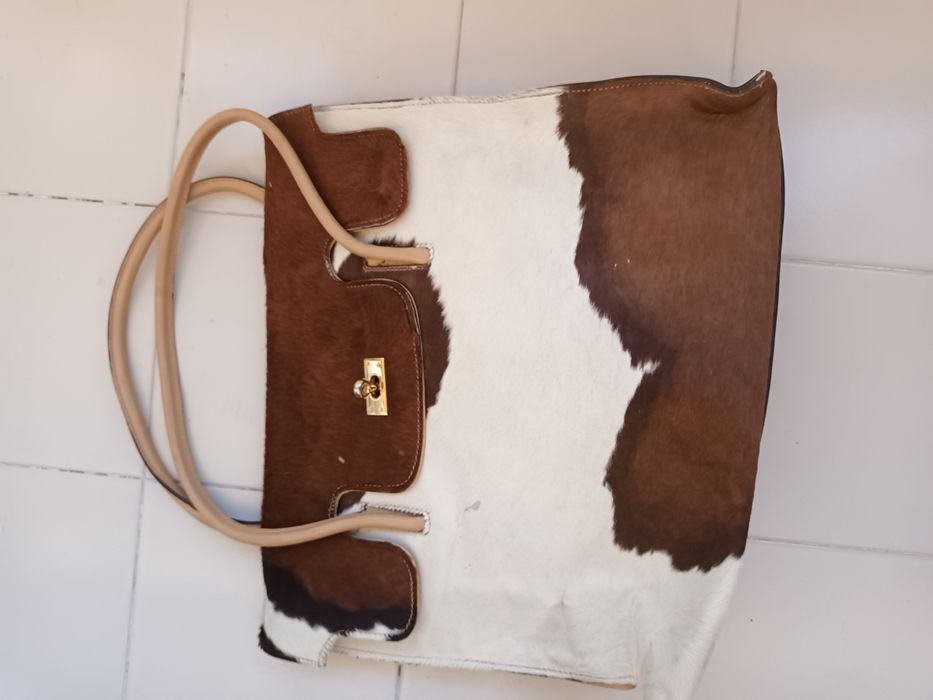 Mala em pele de vaca