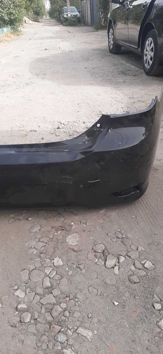Бампер задній TOYOTA Corolla E150 2011 (під пайку).