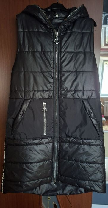 Жилетка жіноча в гарному стані