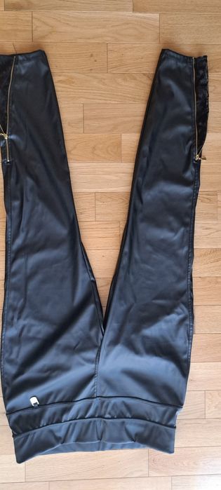 Spodnie z eko skóry L koronka