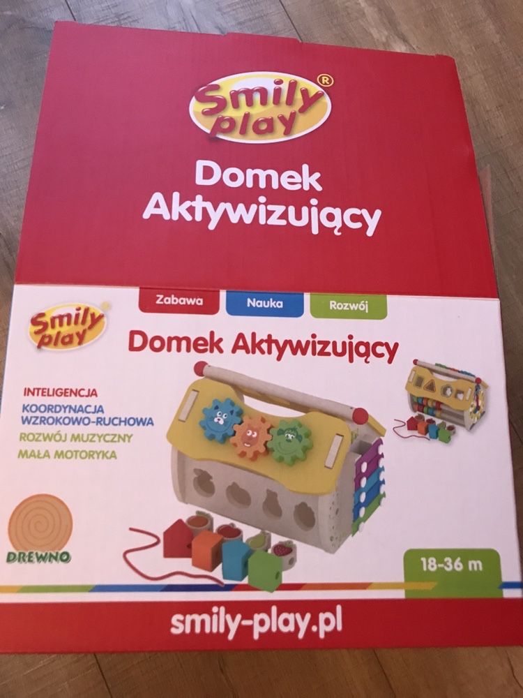 Domek aktywizujący Smily play, sorter, zegar, cymbałki, koła zębate