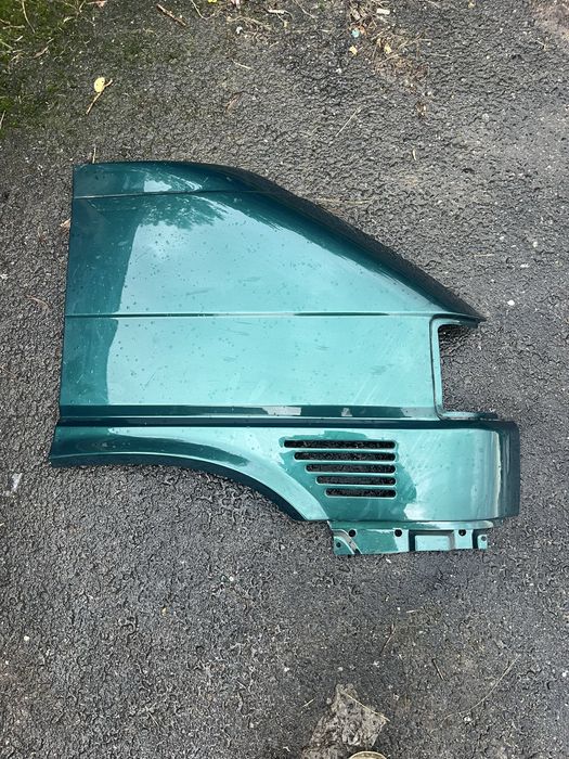 Blotnik VW T4 Caravelle nowy orginalny