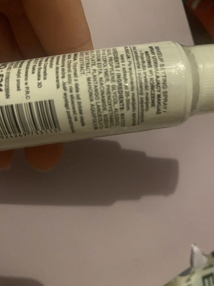 Spray do utrwalenia makijażu lasting sync