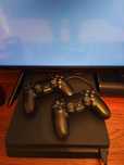 PlayStation 4 + 2 comandos + Jogos