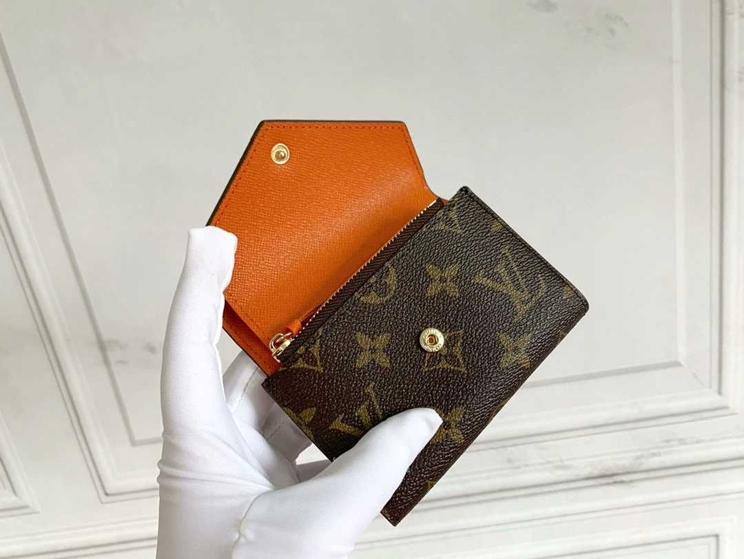 Nowe Louis Vuitton Victorine Mały portfel Pomarańczowy przycisk