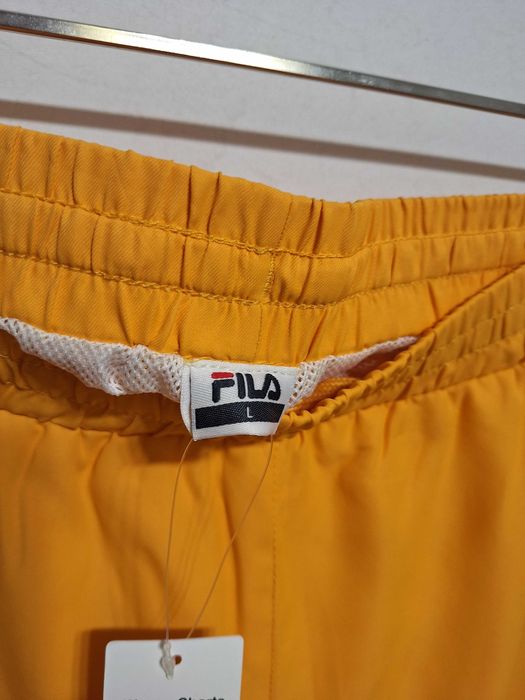 Нові жовті шорти Fila