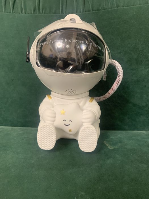 Лазерний нічник проектор зоряного неба «Астронавт»  Космонавт СИДИТ