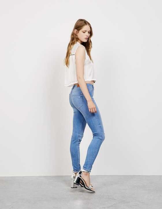 BERSHKA jeans rurki SKINY przecierane DZIURY 34 XS