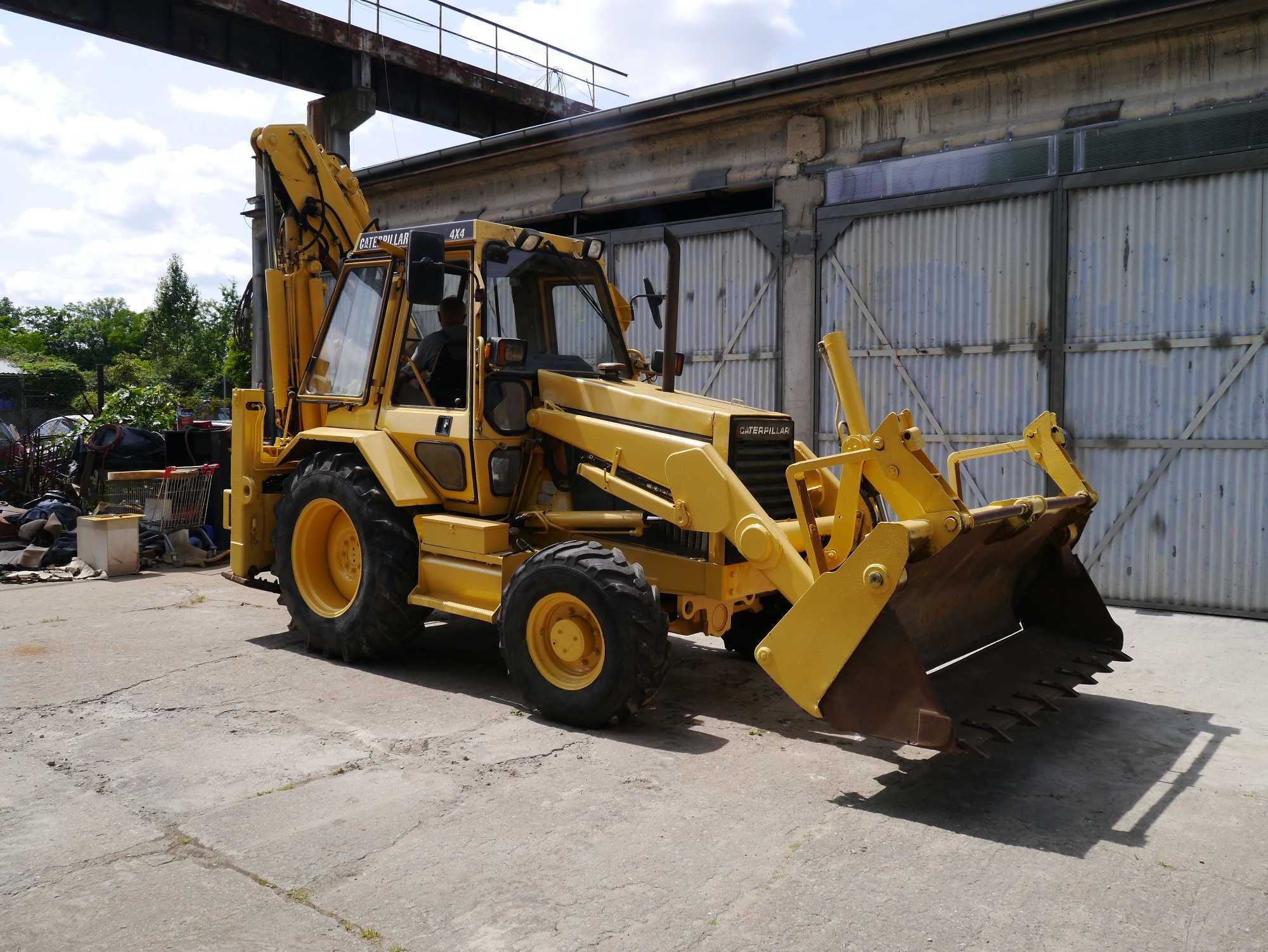 Koparko-ładowarka Caterpillar 428, 1990r
