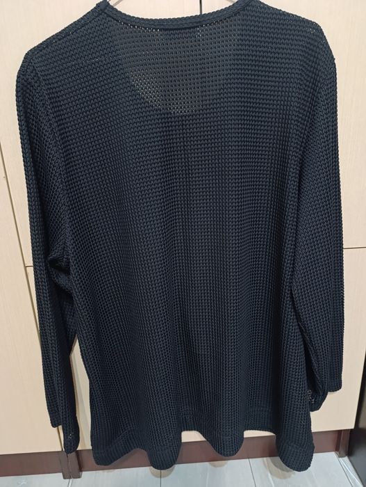 Жіноча кофта в сіточку