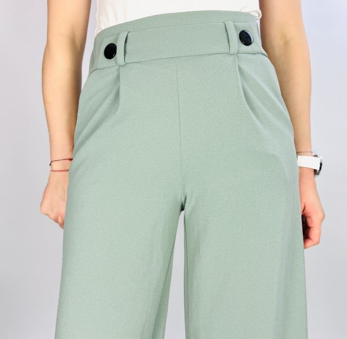 Miętowe spodnie z szeroką nogawką XS 34