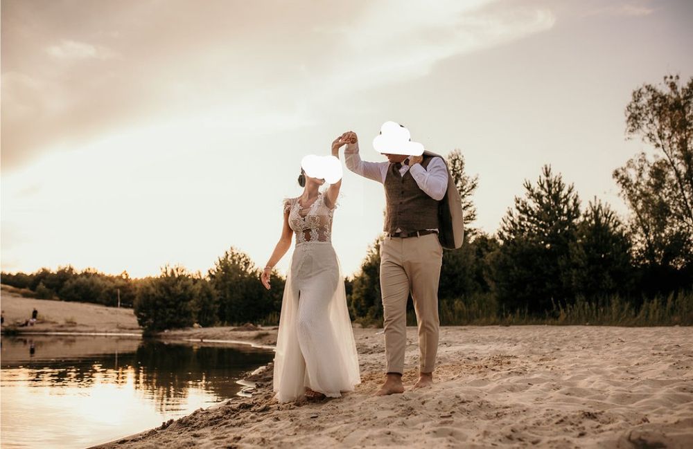 Suknia ślubna syrenka/rybka z piórami, tren r.34-36