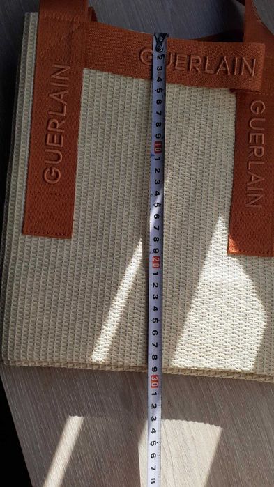 Saco beje Guerlain com pegas novo