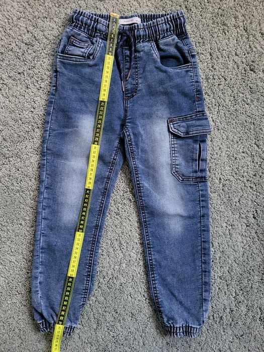 Spodnie typu jogger r. 122 reserved stan idealny