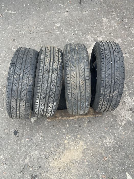 Продам колеса в сборе r 14 4*100 резина 175/65 premiorri