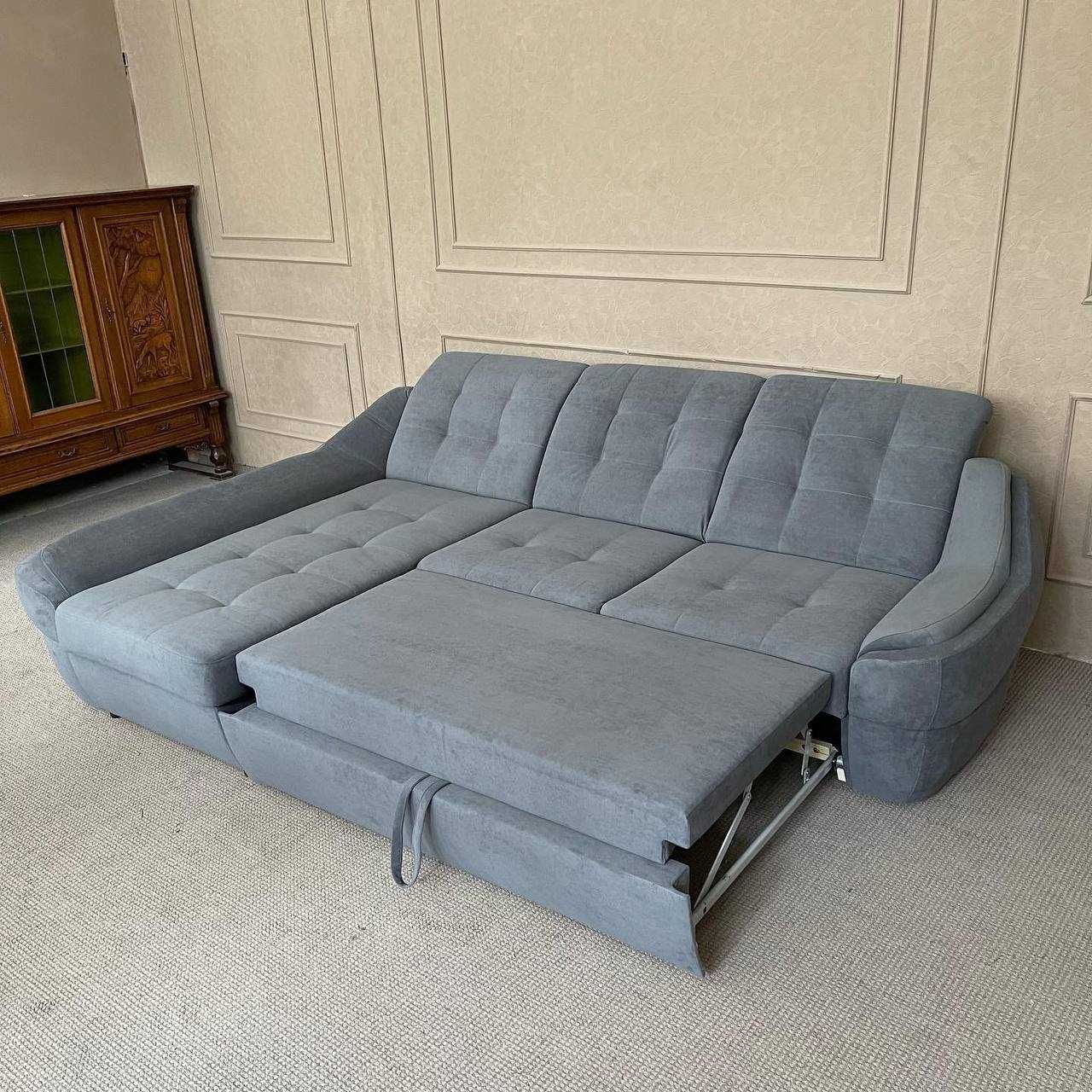 Кутовий розкладний диван в тканині новий
