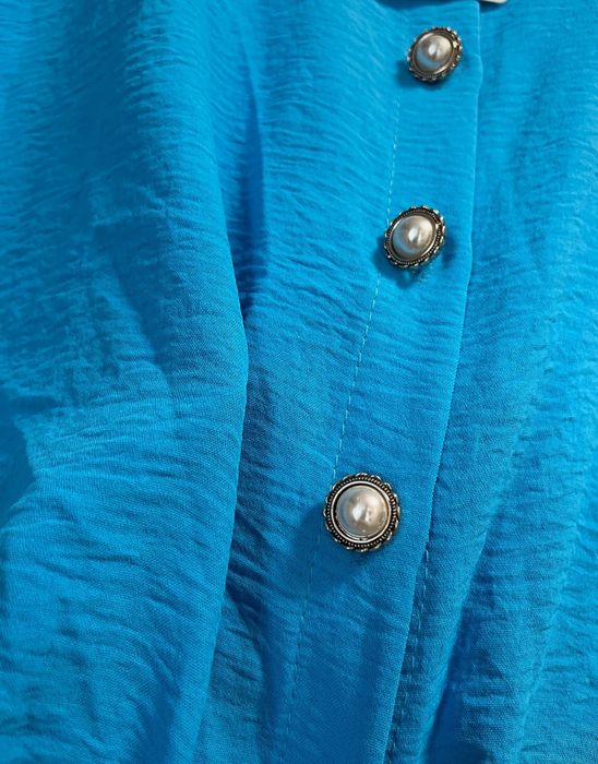 Bluzka wiązana New Collection  r.uni