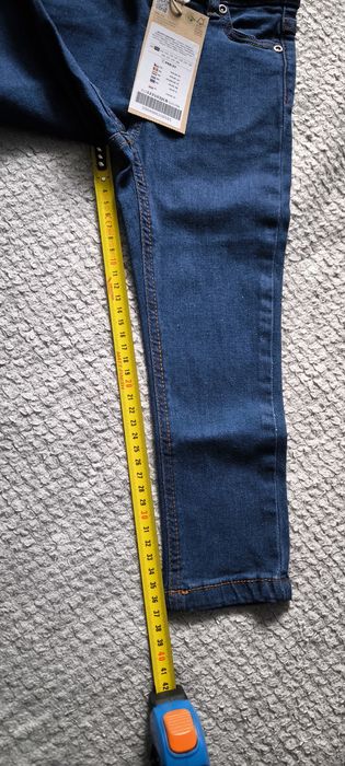 Nowe spodnie jeansowe coccodrillo r. 98