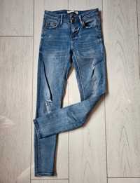 Spodnie jeansowe skinny niebieskie z dziurami rozmiar XS