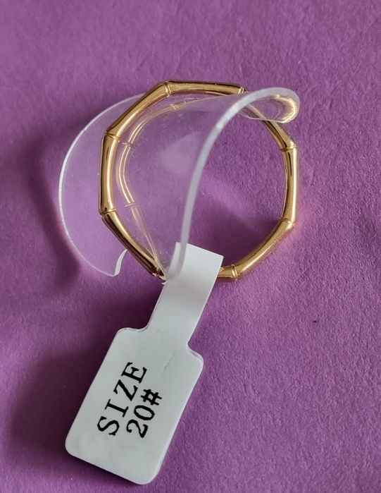 Anel/aliança dourado, em aço, estilo "cana de bambu". T20bambu