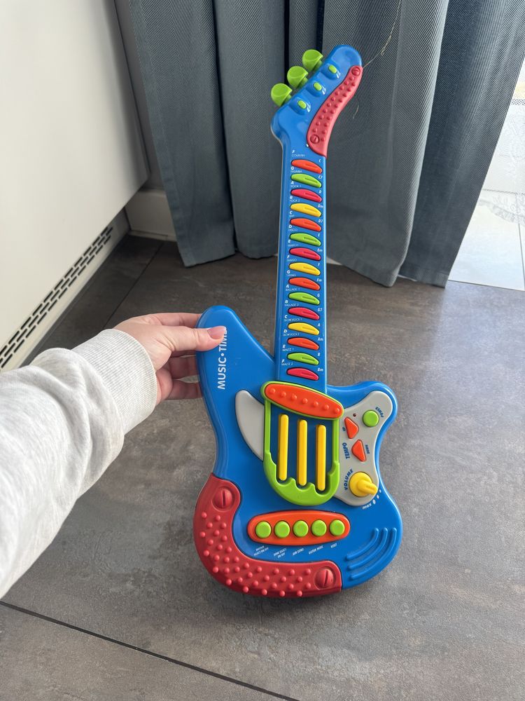 Elektryczna gitara grająca zabawka interaktywna niebieska gra instrume