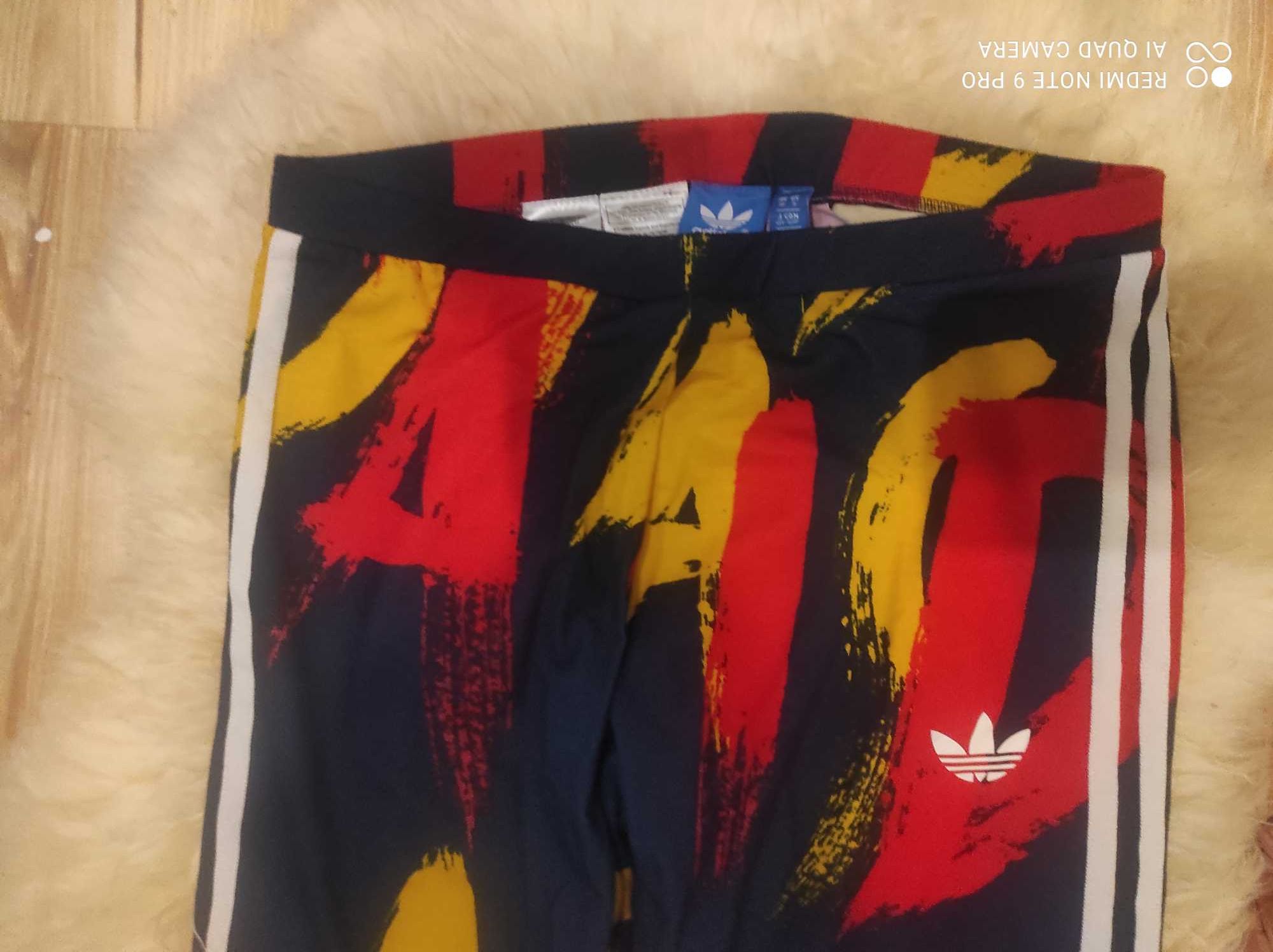 Kolorowe długie legginsy adidas S 36