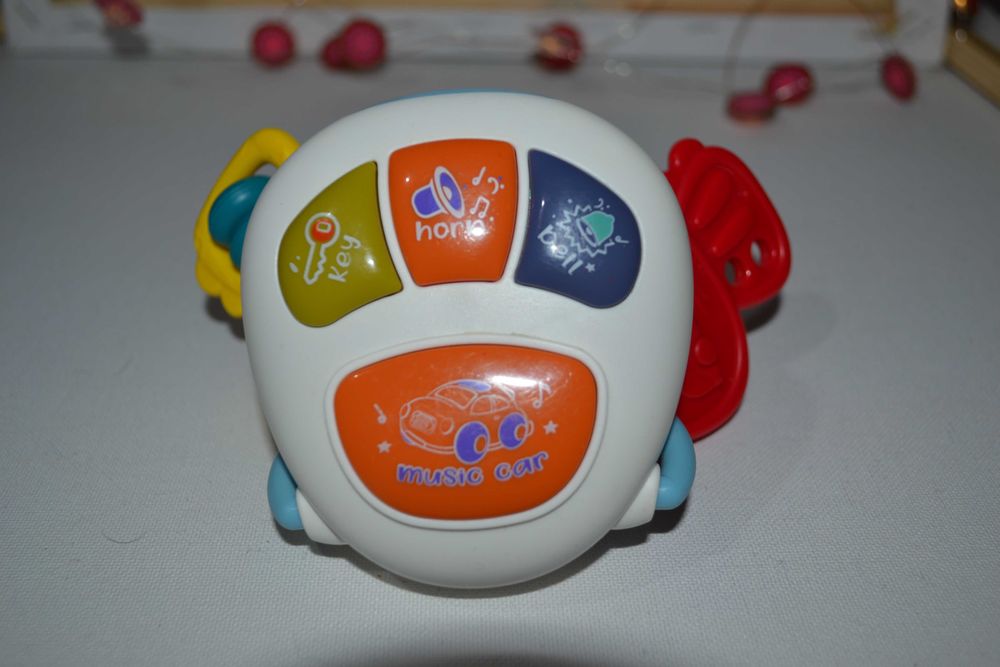 Розпродаж Музична іграшка брязкальце зі світловими ефектами Брелок з к