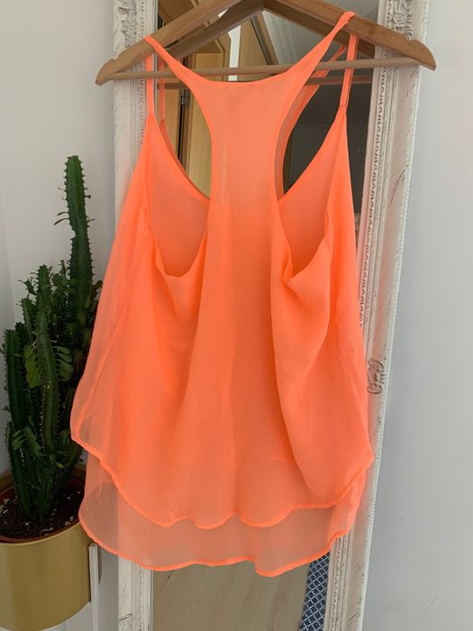 Top fluido coral neon
