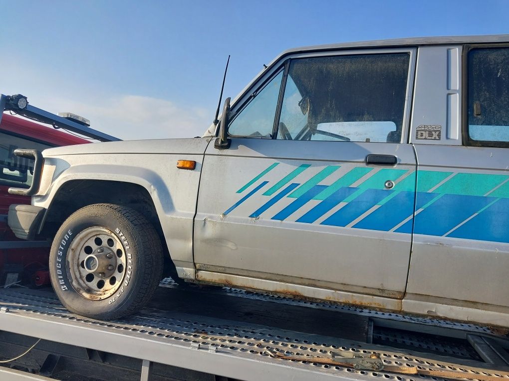 Isuzu trooper I 2.6 benzyna na części silnik skrzynia drzwi most