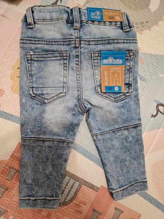 Nowe jeansy dziecięce 74