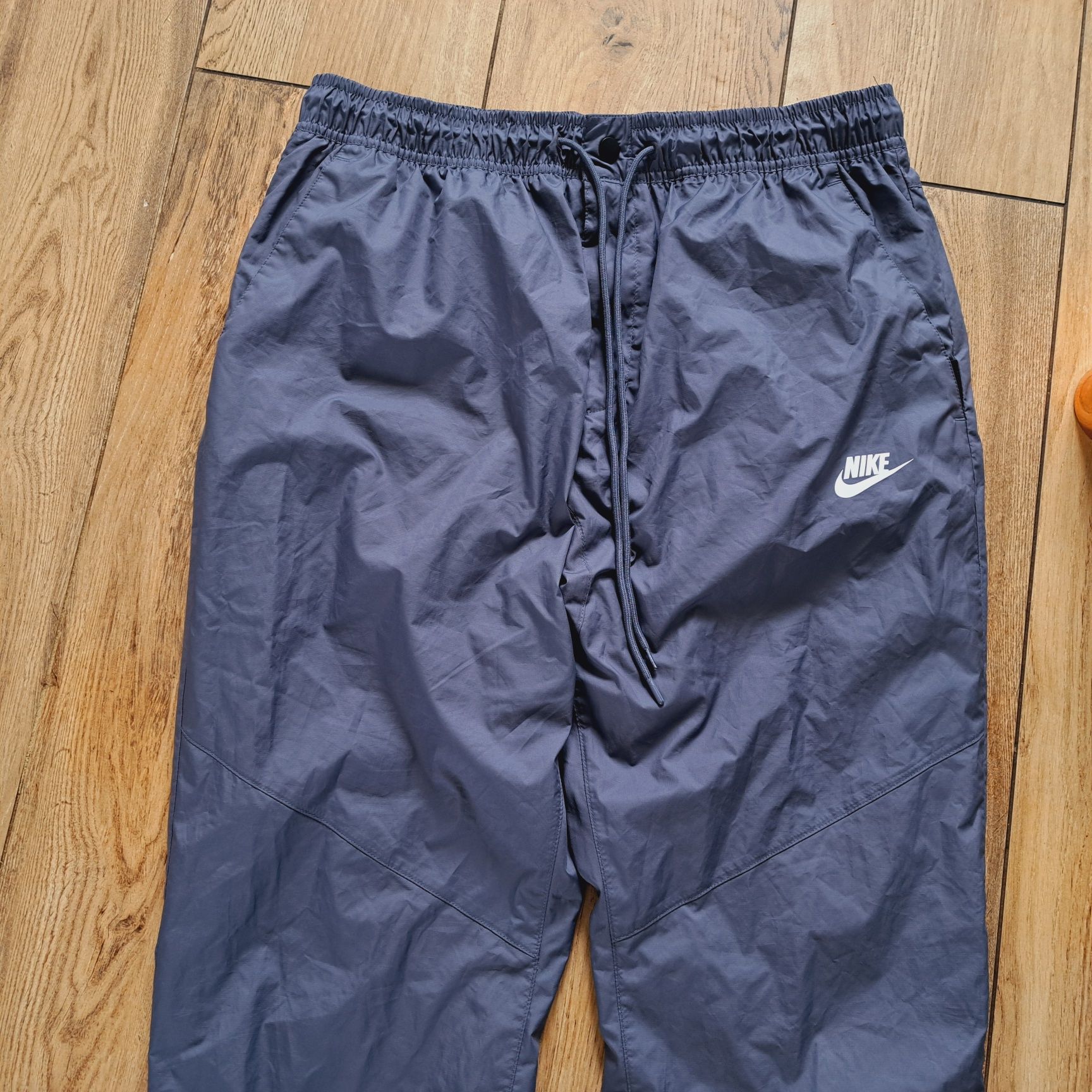 Spodnie Nike Wind running do biegania sportowe