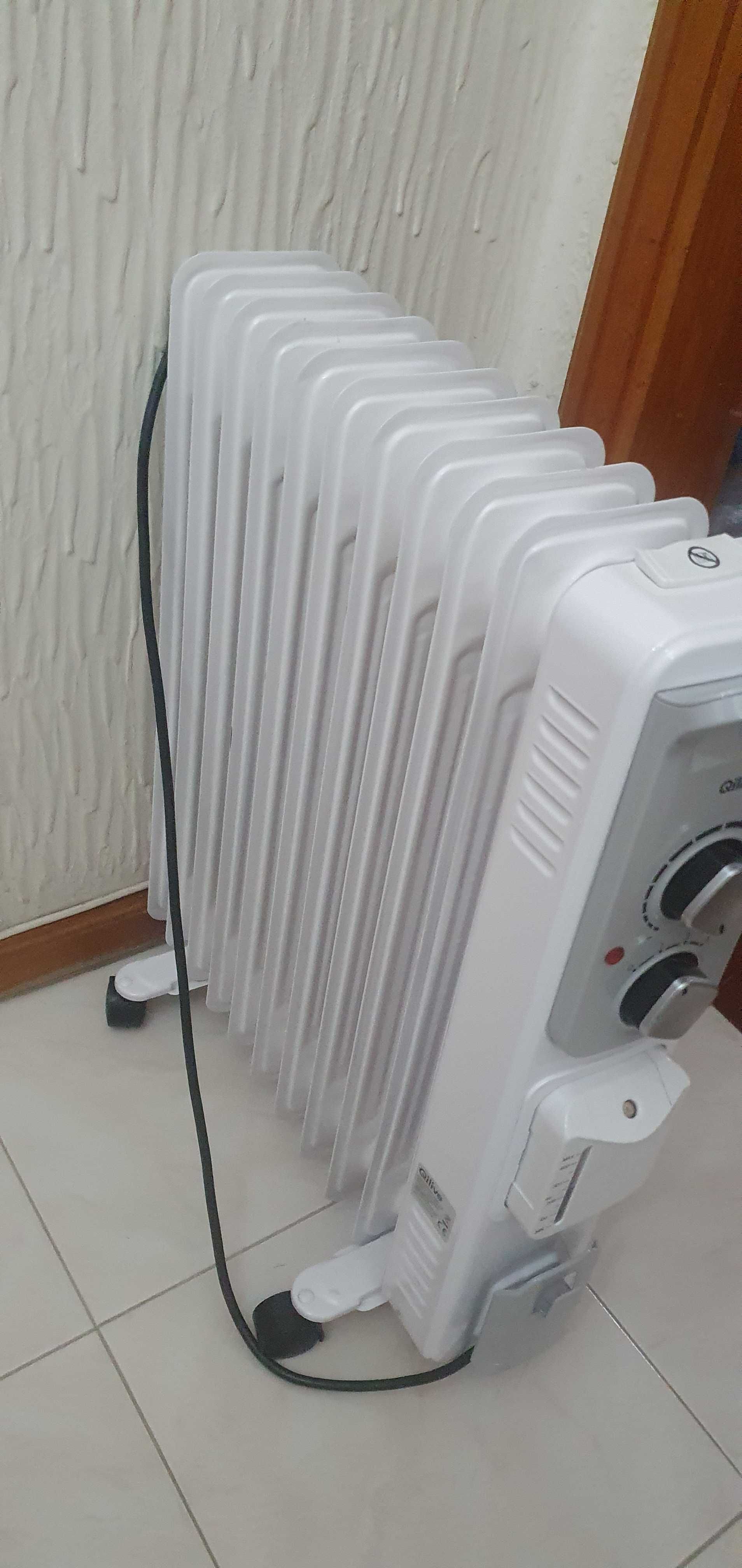 Vendo aquecedor a óleo portatil económico