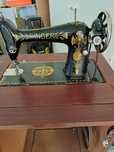 Maquina de costura marca singer