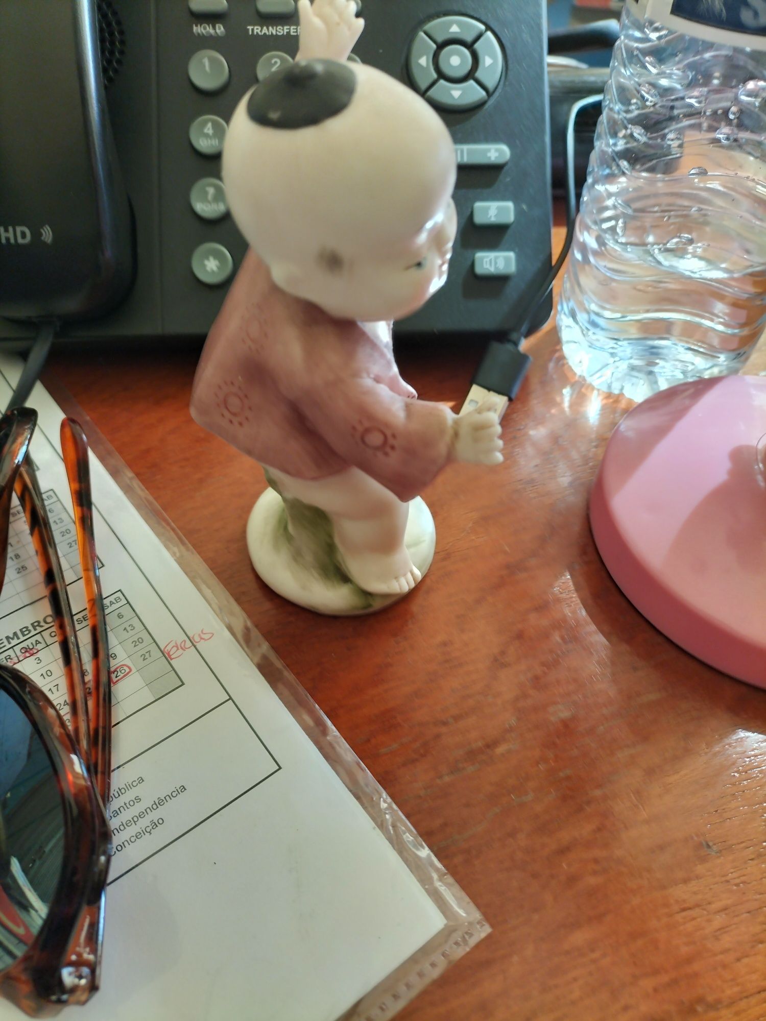 Ventoinha da hello Kitty e boneco de porcelana biscuit