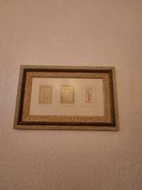 Quadro em branco e dourado com imagens gregas