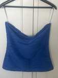 Top azul cai cai
