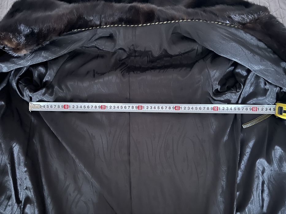 норкова шуба тепла