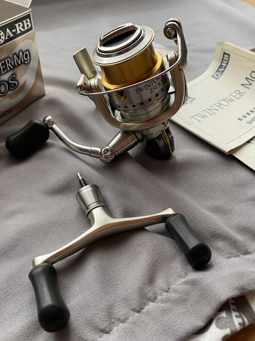 Kołowrotek Shimano Twin Power 06 Mg 2500s 3 szpule 2 korbki