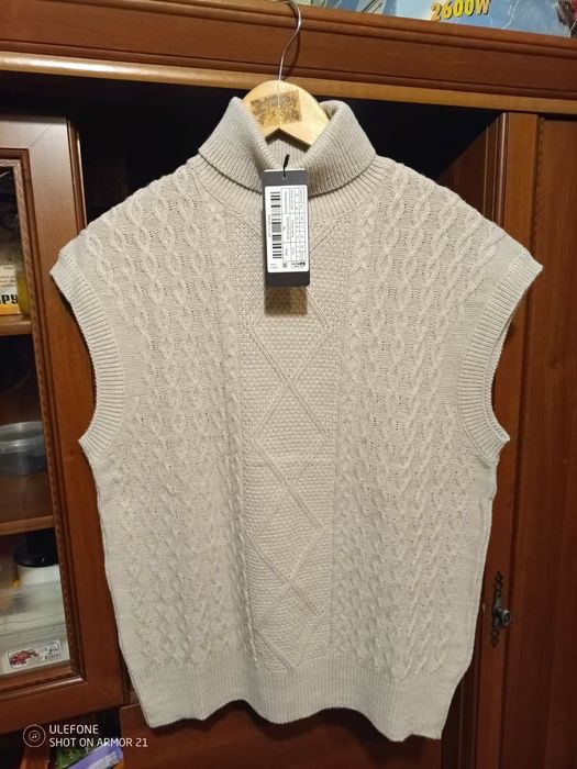 Продам   женскую  жилетку.