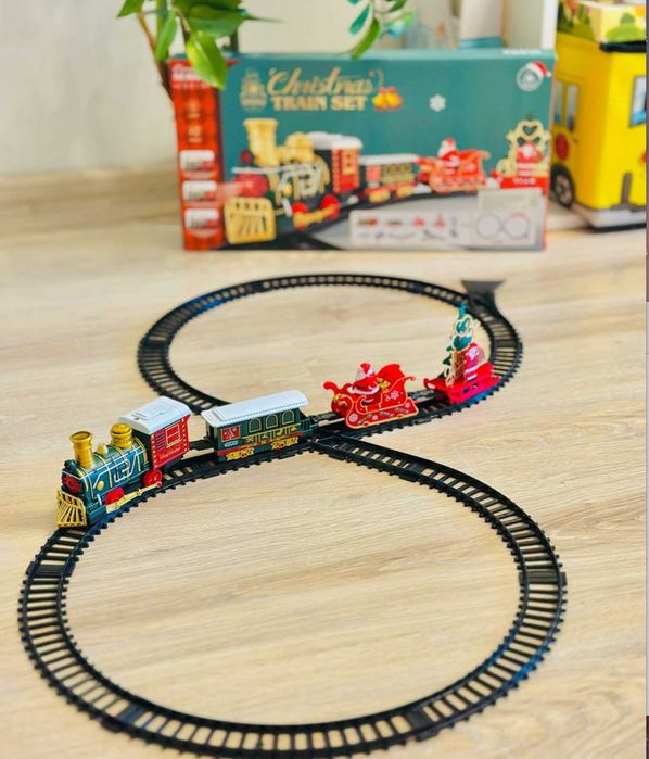 Різдвяний поїзд з вагонами залізна новорічна дорога потяг залізниця