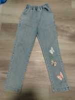 Spodnie jeansowe r. 140