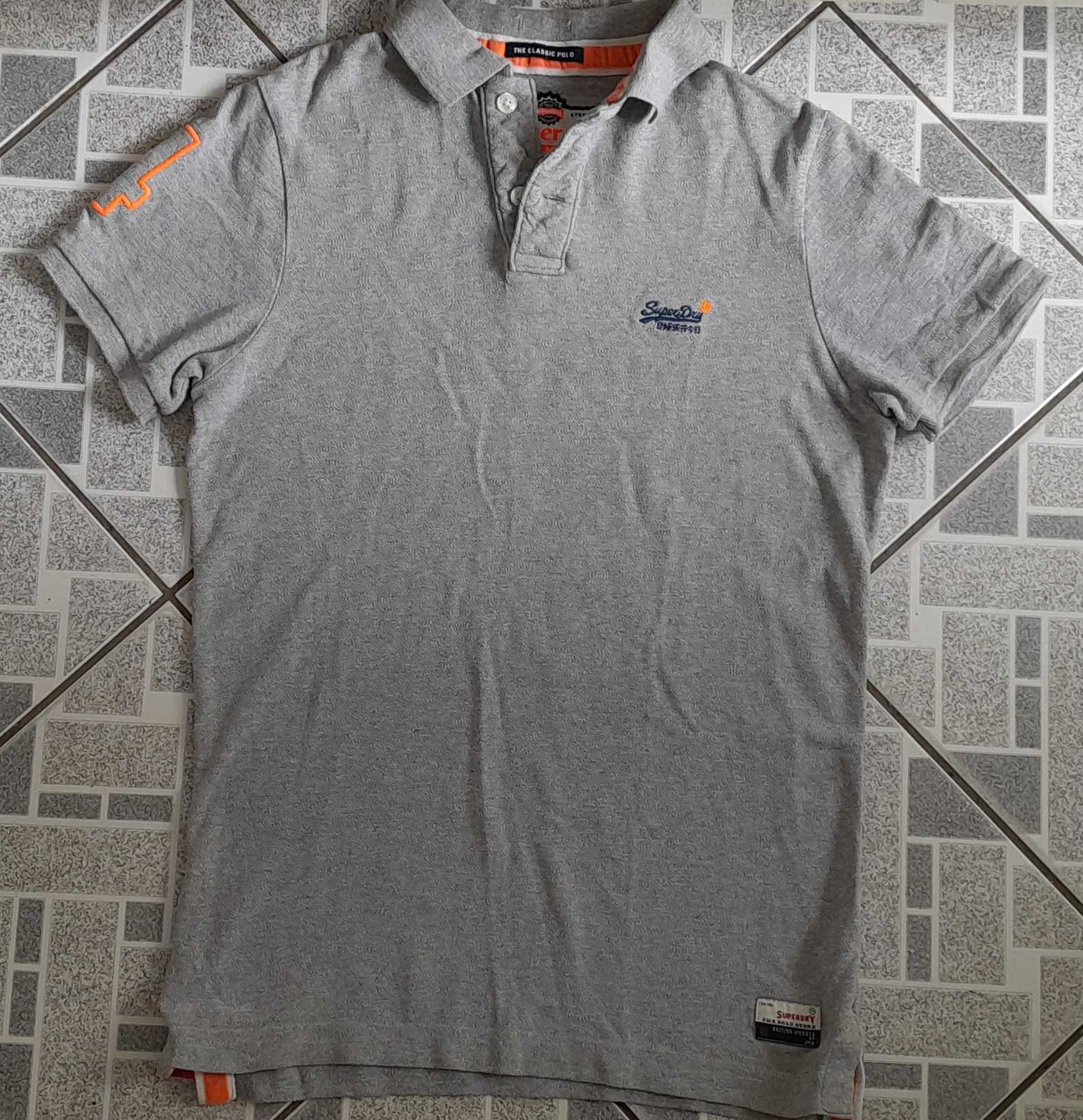 bluzeczka polo krótki rękaw SuperDry rozm. 182 ( S )