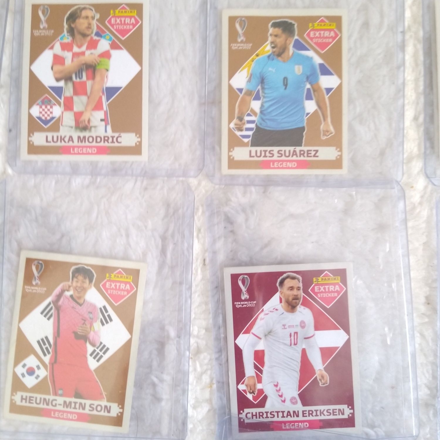 Cromos mundial FIFA 2022 Messi Modric Eriksen Son Suarez Ochoa Vlaovic