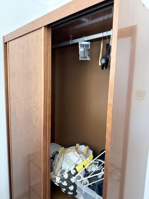 Guarda fato como novo