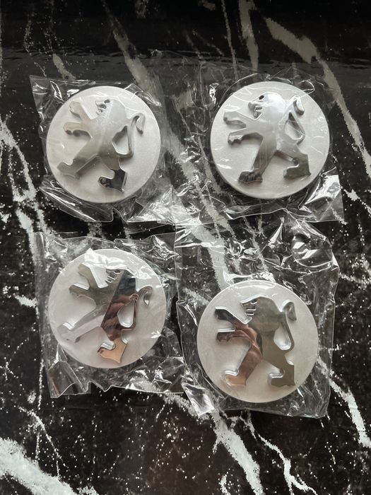 Ковпаки на диски Пежо