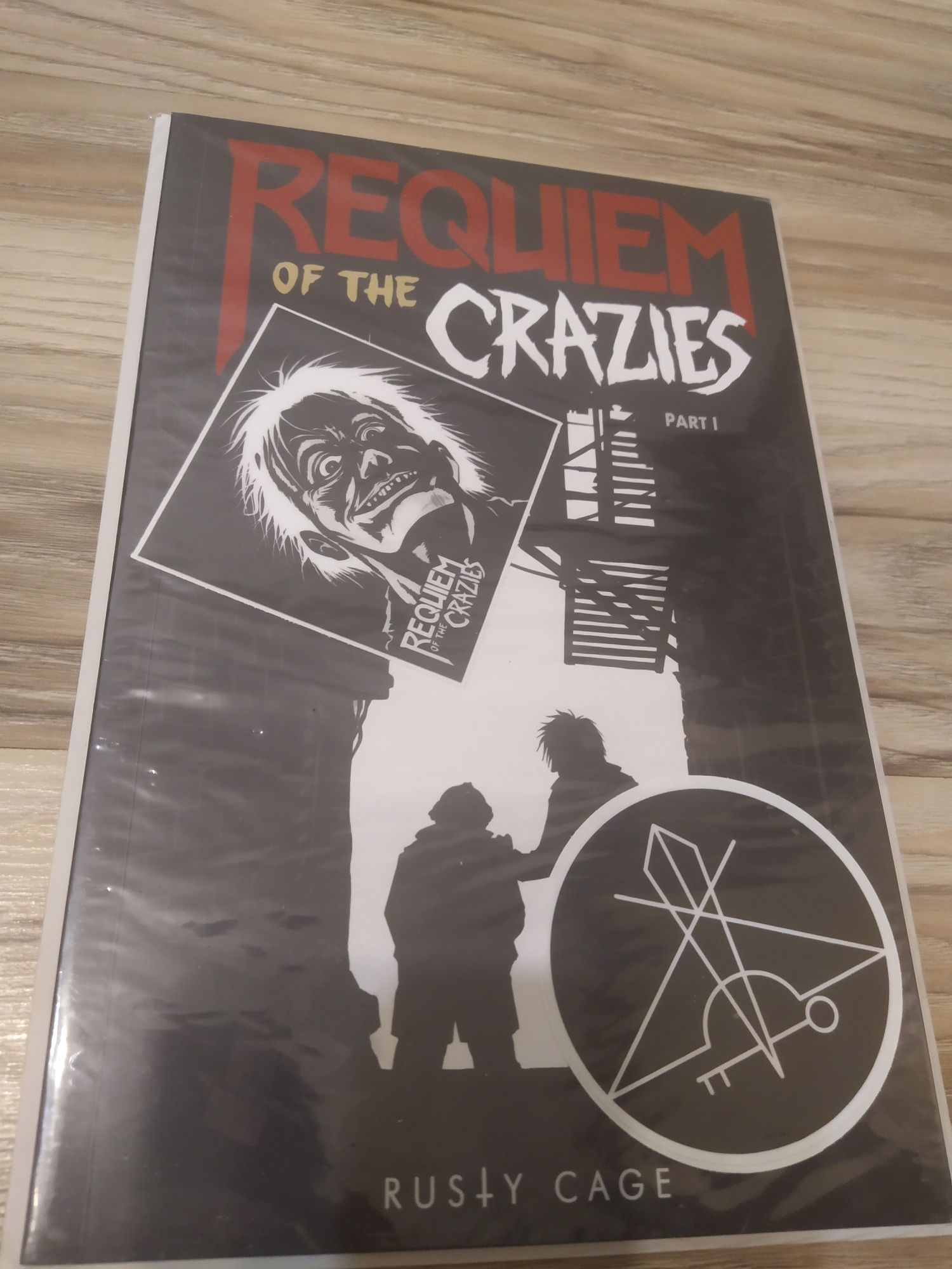 Komiks Requiem Of The Crazies tom 1 i 2 i gadżety