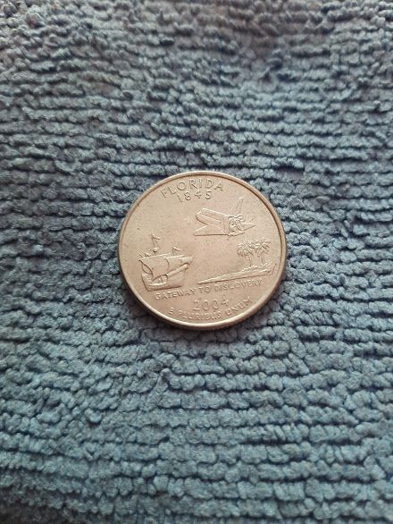 Монета 25 cents (2004).