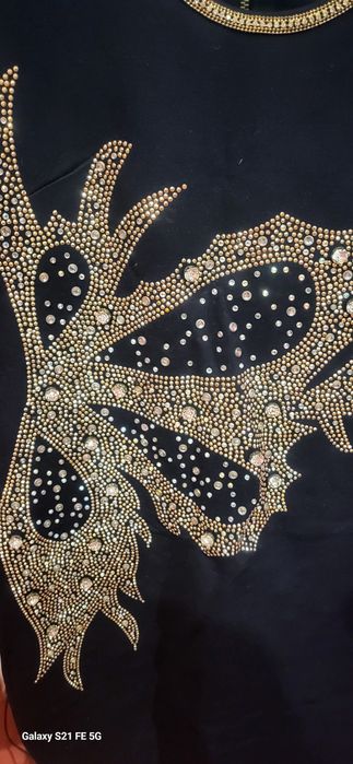 Женское очень нарядное платье .